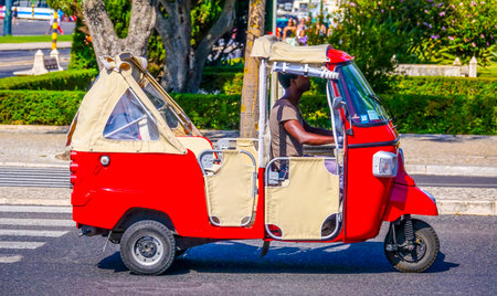 Small Tuk Tuk Car in the streets of Lisbonのeditorial素材