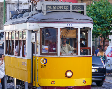 The famous tram Electrico in the streets of Lisbon - typical view - LISBON, PORTUGAL 2017のeditorial素材
