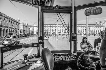 Inside the famous old tram Electrico in Lisbon - popular tourist attraction - LISBON / PORTUGAL - JUNE 16, 2017のeditorial素材