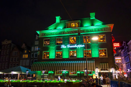 Colorful illuminated buildings in the city center of Amsterdam - AMSTERDAM - THE NETHERLANDS - JULY 20, 2017のeditorial素材