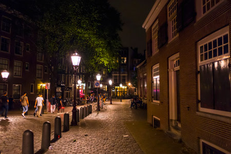 The beautiful small lanes and Sidewalks in the city center of Amsterdam - AMSTERDAM - THE NETHERLANDS - JULY 20, 2017のeditorial素材