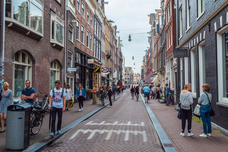 The attractive pedestrian zones with its shops in Amsterdam - AMSTERDAM - THE NETHERLANDS - JULY 20, 2017のeditorial素材