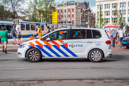 Amsterdam Police Car in the city - AMSTERDAM - THE NETHERLANDS - JULY 20, 2017のeditorial素材