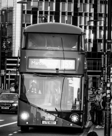 Red Buses on Westminster Bridge in London at sunset - LONDON / GREAT BRITAIN - SEPTEMBER 19, 2016のeditorial素材