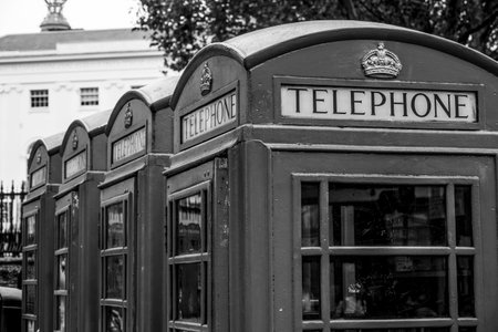 Row of typical London Telephone booths - phone booth - LONDON / GREAT BRITAIN - SEPTEMBER 19, 2016のeditorial素材