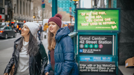 Two girls on a sightseeing tour to New York City - NEW YORK, UNITED STATES - DECEMBER 4, 2018のeditorial素材