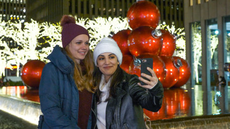 Two girls visit New York at wonderful Christmas time - NEW YORK, UNITED STATES - DECEMBER 4, 2018のeditorial素材