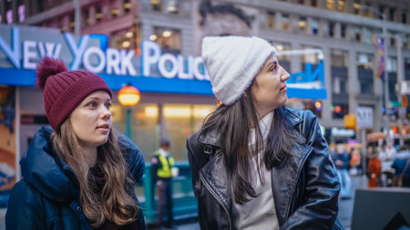 Two friends enjoy their vacation trip to New York - NEW YORK, UNITED STATES - DECEMBER 4, 2018のeditorial素材