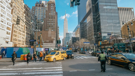 Street corner in Manhattan with a view over Empire State Buildin