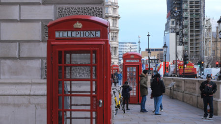 Typical London street view with red telephone booth - LONDON, ENGLAND - DECEMBER 15, 2018のeditorial素材