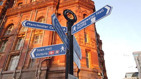 Direction signs in the city center of Manchester - MANCHESTER / ENGLAND - JANUARY 1, 2019のeditorial素材