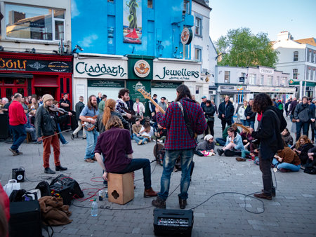 Street musicians in the city of Galway Ireland - GALWAY, IRELAND - MAY 11, 2019のeditorial素材