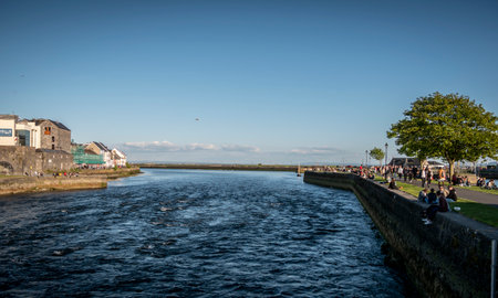 Popular pier at Galway Claddagh - GALWAY, IRELAND - MAY 11, 2019のeditorial素材