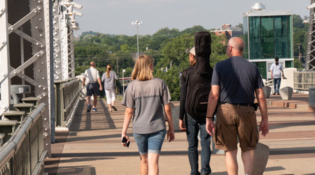 Musicians walking on John Seigenthaler Pedestrian Bridge in Nashville - NASHVILLE, USA - JUNE 15, 2019のeditorial素材