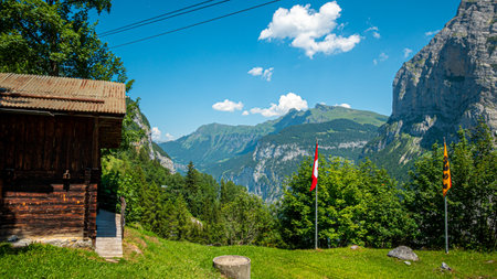 Typical wooden huts in the Swiss Alps - SWISS ALPS, SWITZERLAND - JULY 22, 2019のeditorial素材