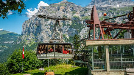 Swiss Skyline Telefric called Schilthornbahn in the Swiss Alps - SWISS ALPS, SWITZERLAND - JULY 22, 2019のeditorial素材