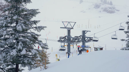 Winter landscape in the fog in the Swiss Alps - ENGELBERG, SWISS ALPS - FEBRUARY 5. 2020