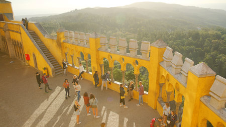 Tourists visiting the Palace of Pena in Sintra - CITY OF LISBON - SINTRA. PORTUGAL - OCTOBER 15,...