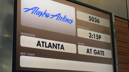 Info screen at the gate of New Orleans International Airport - NEW ORLEANS, LOUISIANA - APRIL 18, 2016のeditorial素材