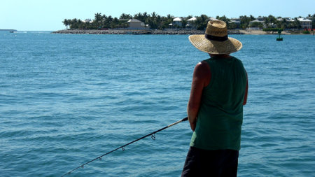 Angler at Key West - fisher on duty - KEY WEST, USA APRIL 13, 2016 - travel photographyのeditorial素材