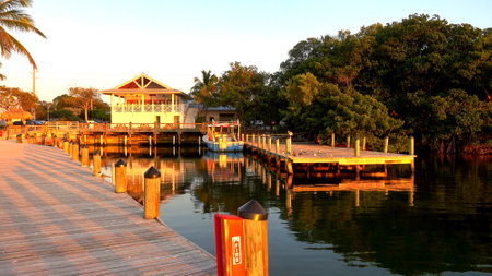 Small pier on the USA Keys in the evening sun- ISLAMORADA, USA - APRIL 12, 2016のeditorial素材