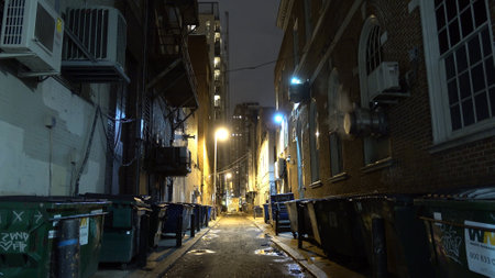 Small and creepy lane in Philadelphia at night - PHILADELPHIA, UNITED STATES - APRIL 7, 2017