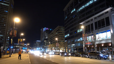 Street traffic in Baltimore at night - BALTIMORE, UNITED STATES - APRIL 9, 2017のeditorial素材