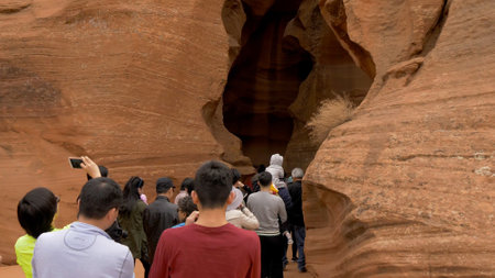 Walking into the Upper Antelope Canyon in Arizona - PAGE, USA - MARCH 29, 2019のeditorial素材