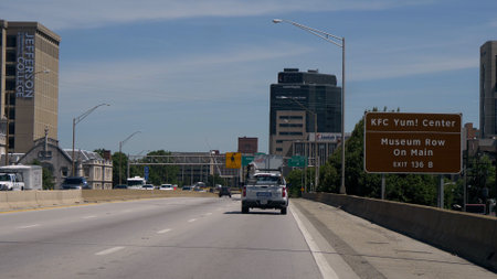 Street sign to KFC Yum Center in Louisville - LOUISVILLE, USA - JUNE 14, 2019のeditorial素材