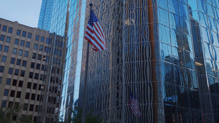 Modern Office buidling and Falg of the United States at Oklahoma City - OKLAHOMA CITY-OKLAHOMA, OCTOBER 21,2017のeditorial素材