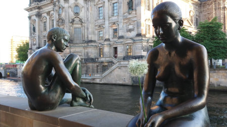 Bronze statues at River Spree in Berlin at Berlin Cathedral - BERLIN, GERMANY - MAY 21, 2018のeditorial素材