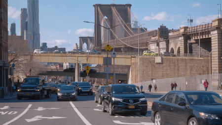 Brooklyn street view with Brooklyn Bridge New York - NEW YORK CITY, USA - APRIL 2, 2017のeditorial素材