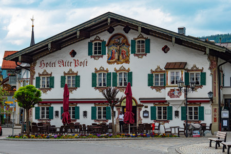 The wonderful and famous painted houses of Oberammergau in Bavaria - OBERAMMERGAU, GERMANY - MAY 27, 2020のeditorial素材