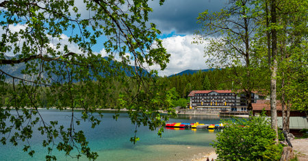 Famous Eibsee Hotel in Grainau at Zugspitze mountain - GRAINAU, GERMANY - MAY 26, 2020のeditorial素材