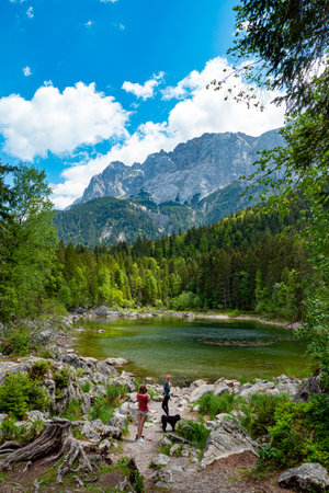 Lake Frillensee in Bavaria is a small and beautiful mountain lake in the German Alps - GRAINAU, GERMANY - MAY 26, 2020のeditorial素材