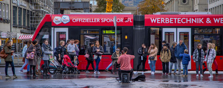 Street musician in the city center of Bern - COUNTY OF BERN. SWITZERLAND - OCTOBER 9, 2020のeditorial素材
