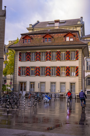 Typical street view in the historic district of Bern - COUNTY OF BERN. SWITZERLAND - OCTOBER 9, 2020