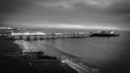 Brighton Pier in England - aerial view in black and white - BRIGHTON, UNITED KINGDOM - DECEMBER 28, 2019のeditorial素材