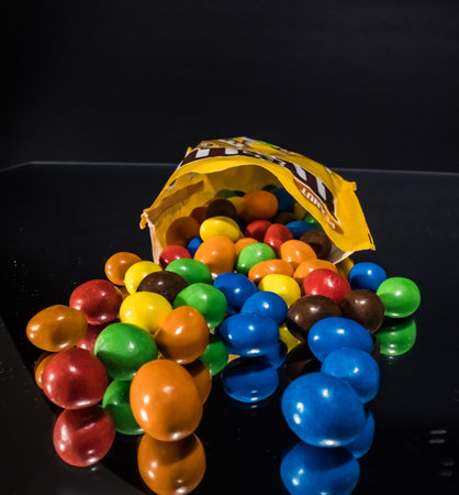 A package of M and Ms Peanuts - a sweet snack close up view - CITY OF FRANKFURT, GERMANY - MARCH 23, 2021のeditorial素材