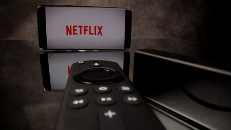 Netflix on Amazon Fire TV Stick 4k in close-up - CITY OF FRANKFURT, GERMANY - MARCH 29, 2021のeditorial素材