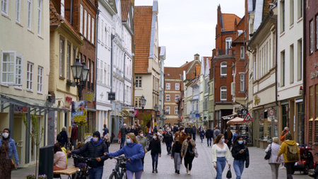 Pedestrian zone in the historic city of Luneburg Germany - LUENEBURG CITY, GERMANY - MAY 11, 2021