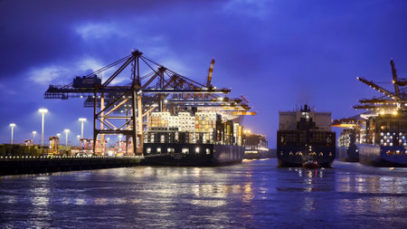 The impressive Port of Hamburg with its huge container terminals by night - HAMBURG CITY, GERMANY - MAY 10, 2021のeditorial素材