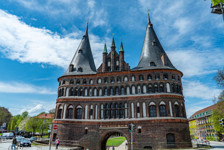 Famous Holsten Gate in the city of Lubeck Germany - CITY OF LUBECK, GERMANY - MAY 10, 2021のeditorial素材