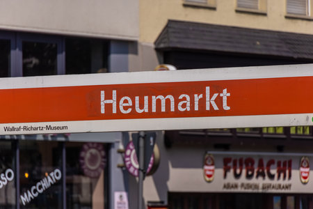 Street sign and tram stop Heumarkt in Cologne - CITY OF COLOGNE, GERMANY - JUNE 25, 2021のeditorial素材