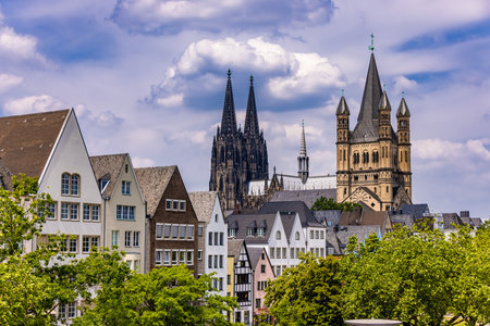 Historical houses and Cathedral in the city of Cologne - CITY OF COLOGNE, GERMANY - JUNE 25, 2021のeditorial素材