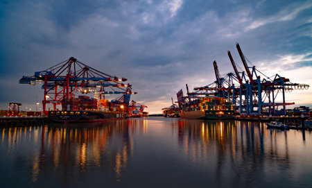 Port of Hamburg in the evening in the back light - CITY OF HAMBURG, GERMANY - MAY 10, 2021のeditorial素材