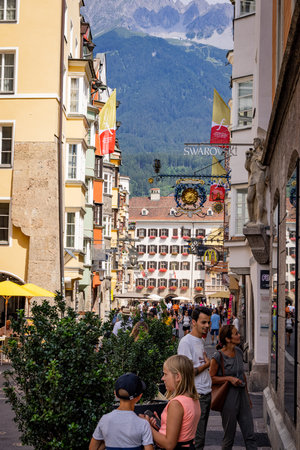 The historic district of Innsbruck with beautiful pedestrian zone and market square - INNSBRUCK, AUSTRIA, EUROPE - JULY 29, 2021のeditorial素材