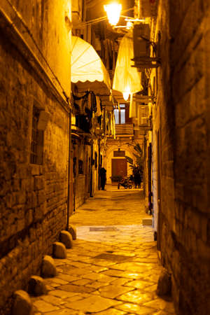 Historic city center of Bari Italy at night - BARI, ITALY - OCTOBER 31, 2021のeditorial素材