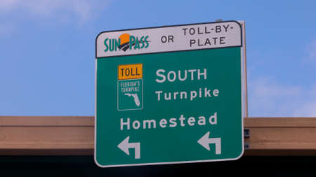 Direction signs To Homestead on the highway - MIAMI, FLORIDA - FEBRUARY 14, 2022のeditorial素材