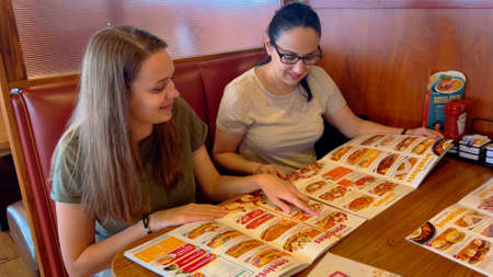 Having breakfast at Dennys American Diner - MIAMI, UNITED STATES - FEBRUARY 20, 2022